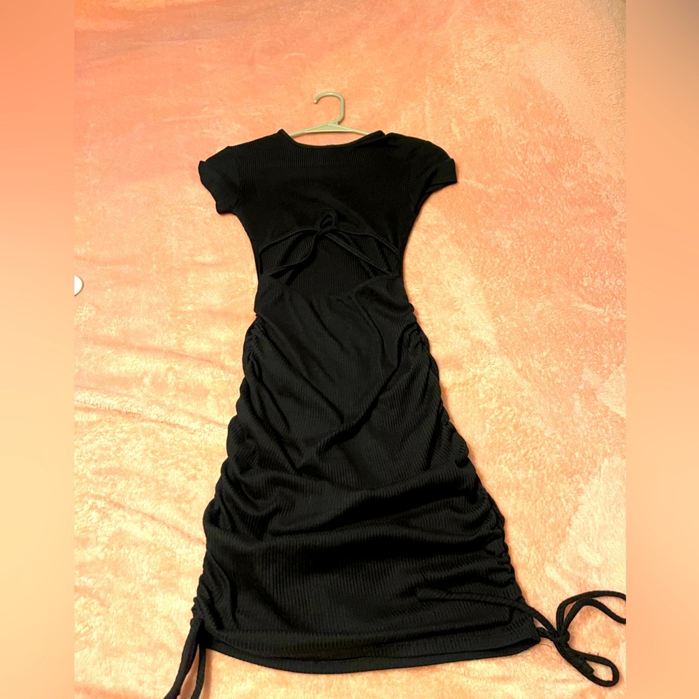 Black dress with scrunch on both side for length change . Size XS- Very stretchy